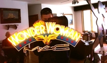 MAC Wonder Woman makeup display neon sign at the Marston family Wonder Woman Museum with Will Holland, granson of William Moulton Marston